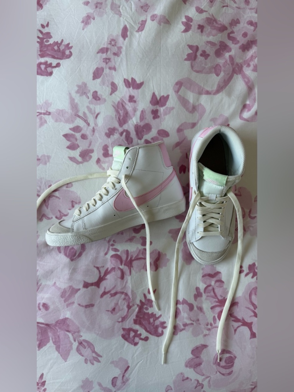 Nike White High-Top Sneakers with Pink Swoosh